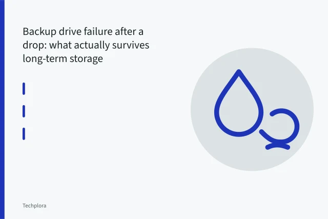 Opened portable hard drive showing scratched platters and read/write head after a drop. Backup drive failure after a drop: what actually survives long-term storage