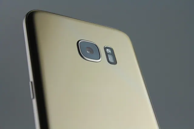 mobile phone, mobile camera, camera, phones, mobile, smart phones, gadget, gold, glass back, phone camera, technology, tech, gray phone, gray camera, gray mobile, gray glass, gray 