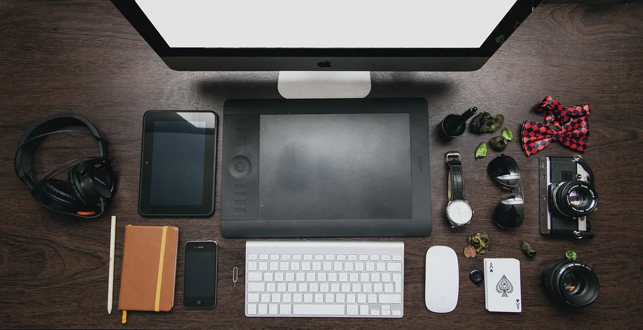home office, desk, tablet, headphones, mac, iphone, kindle, notebook, sunglasses, watch, headphones, headphones, mac, mac, mac, mac, kindle, kindle, kindle, kindle, kindle, sunglasses, sunglasses. Tablet vs e-reader vs laptop: category-level tradeoffs