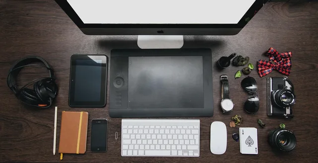 home office, desk, tablet, headphones, mac, iphone, kindle, notebook, sunglasses, watch, headphones, headphones, mac, mac, mac, mac, kindle, kindle, kindle, kindle, kindle, sunglasses, sunglasses. Tablet vs e-reader vs laptop: category-level tradeoffs