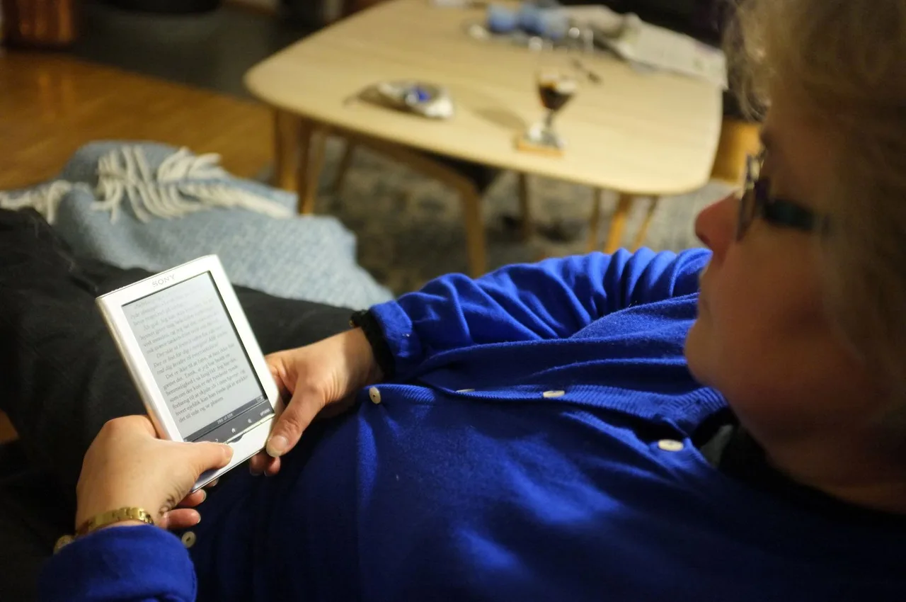 A person reading on an e-reader